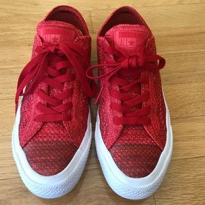red converse flyknit